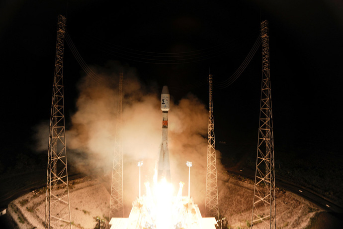 Photograph of Soyuz and Gaia liftoff